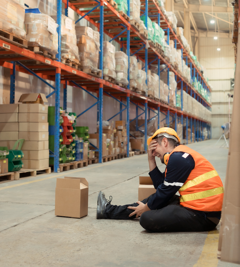A warehouse employee was injured in an accident. because the product package fell from the shelves and crushed the employee's leg severely